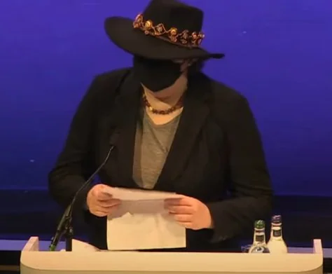 This is a photo of Ursula accepting the Hugo for Best Novella this year in Glasgow. See the magnificent hat, ye mighty, and despair! (photo from File 770)